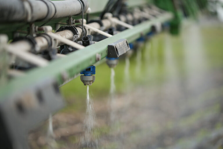 Close up of nozzles on an agricultural sprayer